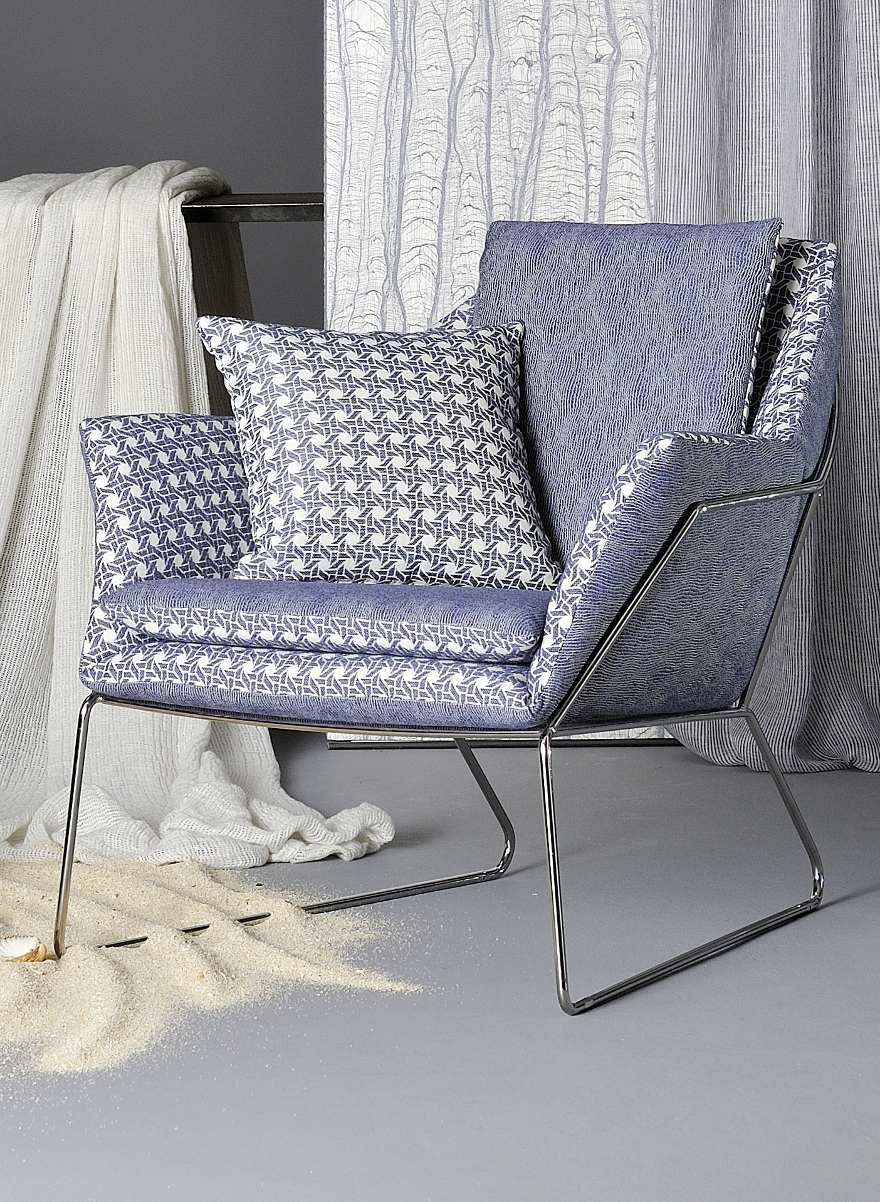 Agena sillón cubierto con tejidos de Viena y Tokio