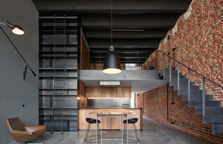 Old brewery converted into an industrial-style loft by CMC Architects