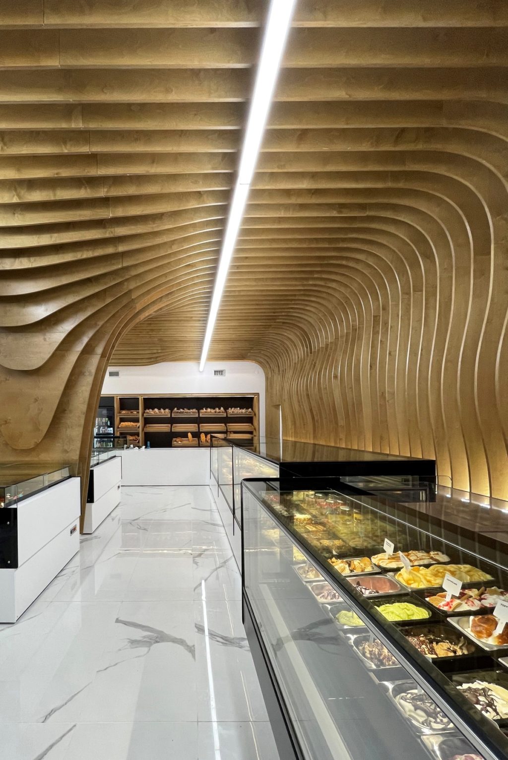 Kedai roti dan pastri di Greece oleh ARCHE Architecture Design Lab kredit foto Christos Dionysopoulos