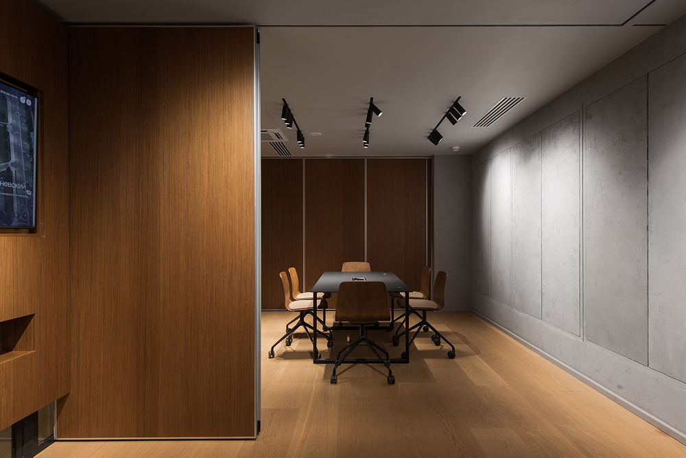 Armonía entre minimalismo y comodidad la nueva oficina GloraX. Estudio de punto de arco