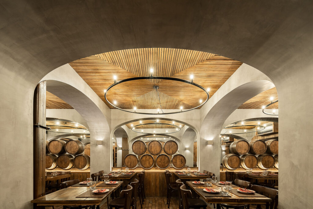 A unique experience in a cellar atmosphere. BARRIL restaurant. PAULO MERLINI architects