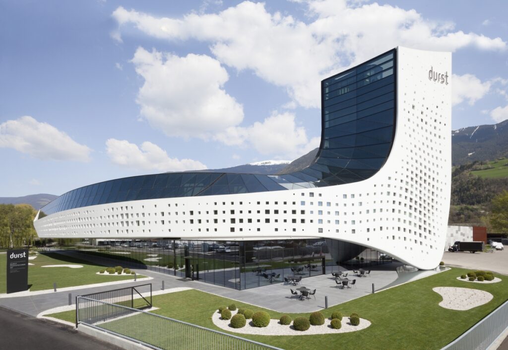A pixelated white wave the iconic headquarters of Durst Group AG. MPV design. ph Paolo Riolzi